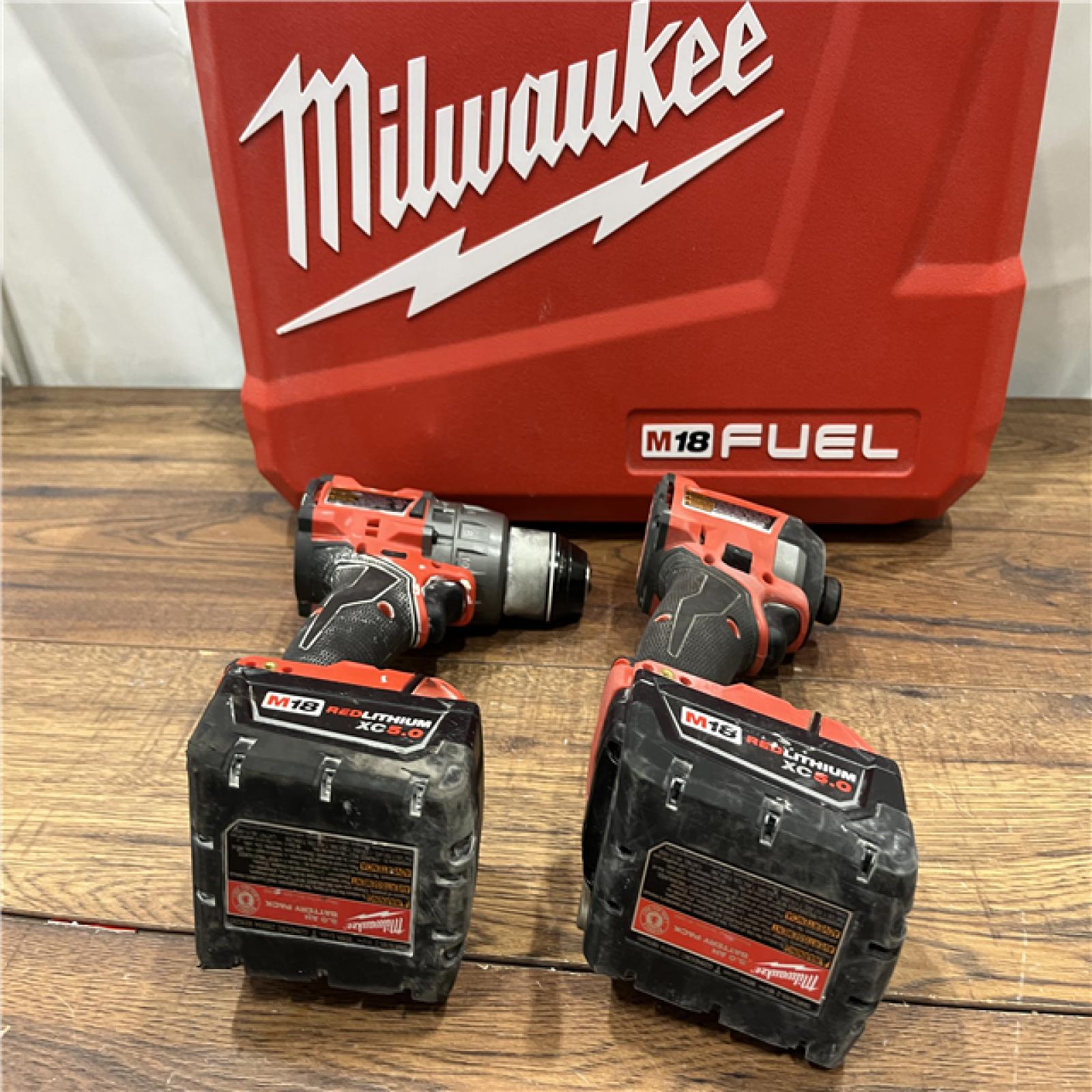 AS IS Milwaukee M18 FUEL 18V Lithium-Ion Brushless Cordless Hammer Drill and Impact Driver Combo Kit (2-Tool) with 2 Batteries