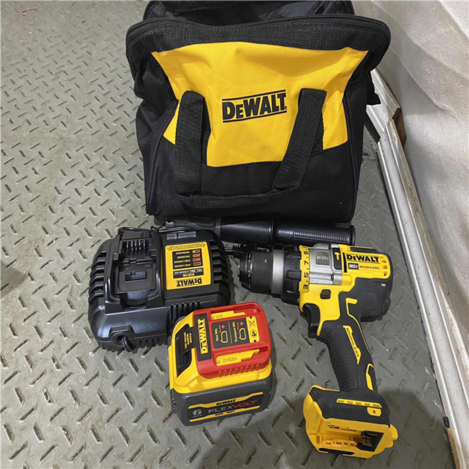 Houston location AS-IS Dewalt FLEXVOLT 20 Volt 1/2 in. Brushless Cordless Hammer Drill/Driver Kit (Battery & Charger)