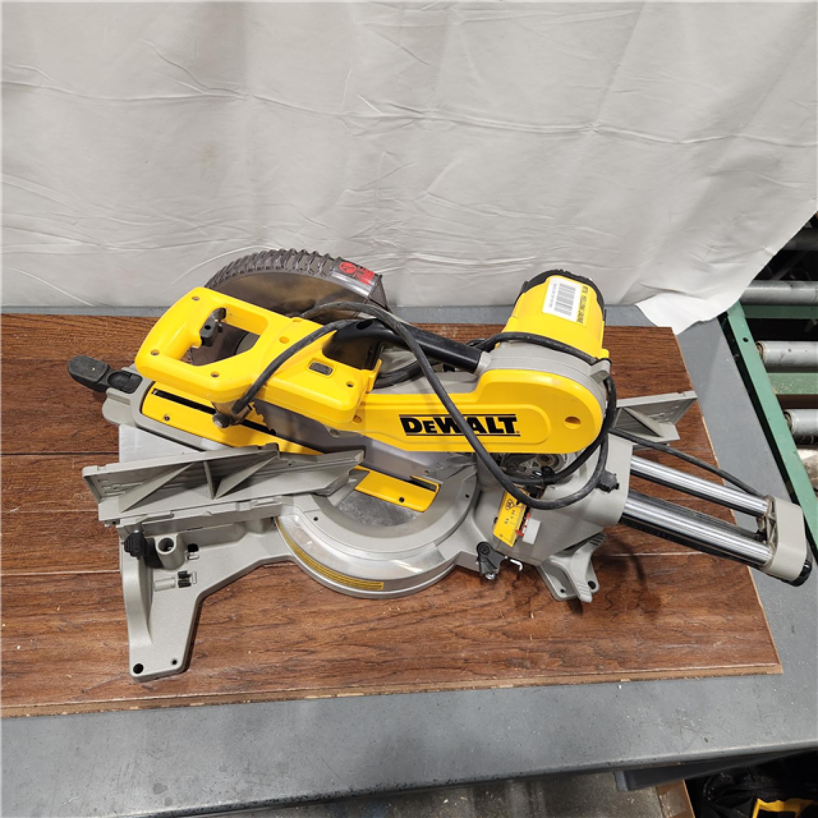 AS-IS DEWALT 15 Amp Corded 12 in. Double Bevel Sliding Compound Miter Saw with XPS Technology, Blade Wrench and Material Clamp