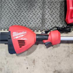 HOUSTON LOCATION - AS-IS (APPEARS LIKE NEW)Milwaukee M18 FUEL 18V Brushless Cordless 17 in. Dual Battery Straight Shaft String Trimmer Kit