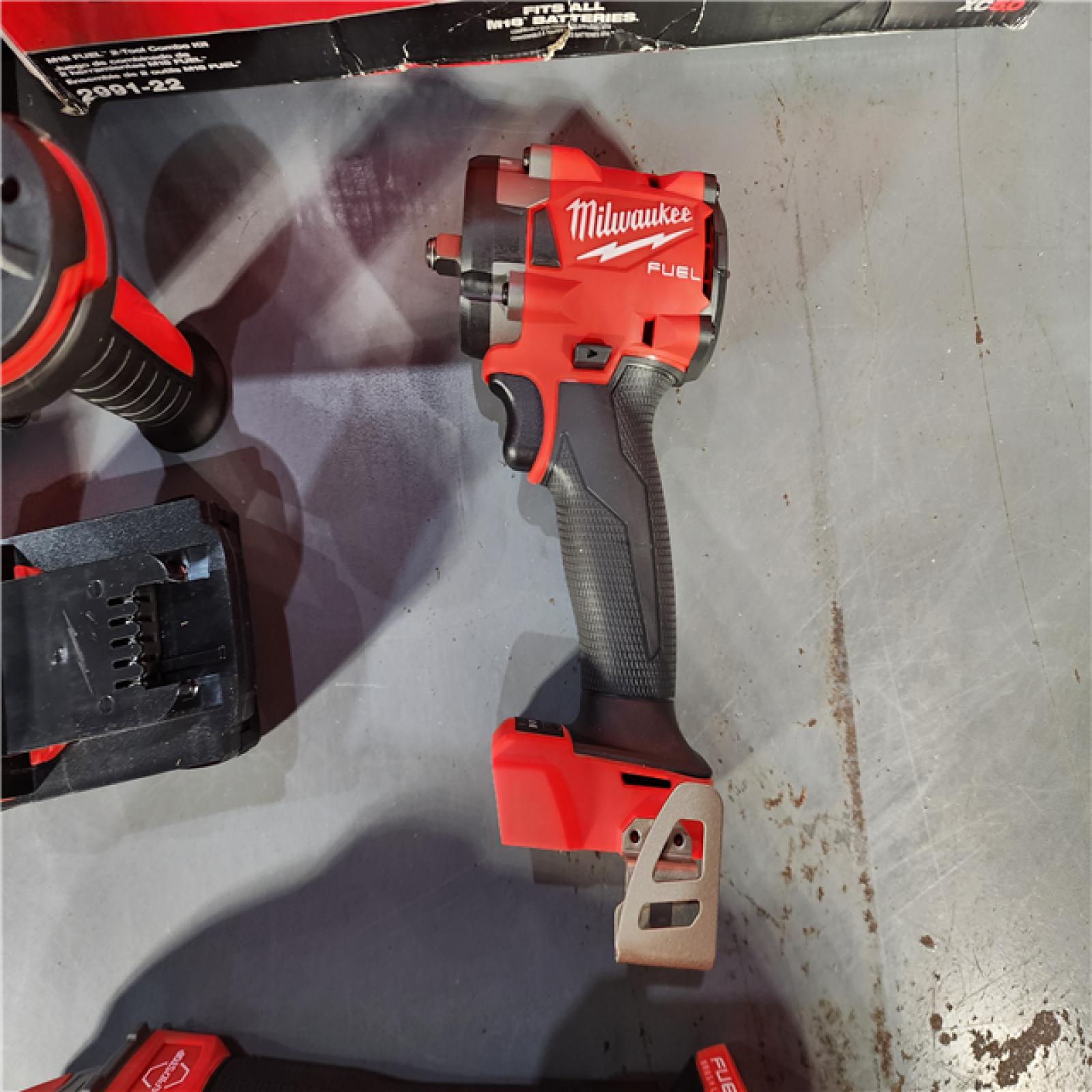 HOUSTON LOCATION - AS-IS (APPEARS LIKE NEW) M18 FUEL 18V Lithium-Ion Brushless Cordless Grinder & 3/8 in. Impact Wrench Combo Kit (2-Tool) W/ Two 5Ah Batteries