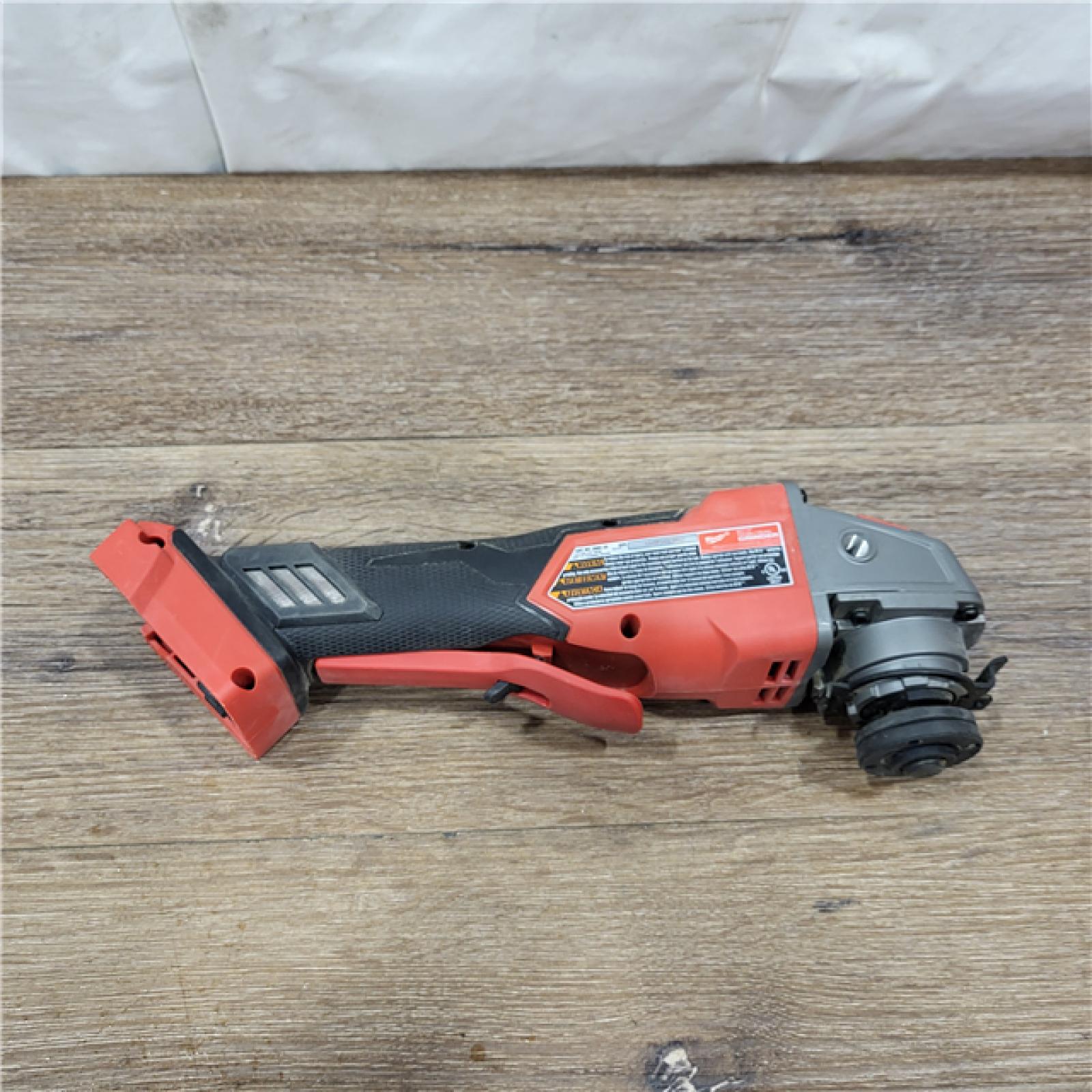 AS-IS Milwaukee 2880-20 M18 FUEL 18-Volt Lithium-Ion Brushless Cordless 4-1/2 in./5 in. Grinder W/Paddle Switch (Tool-Only)