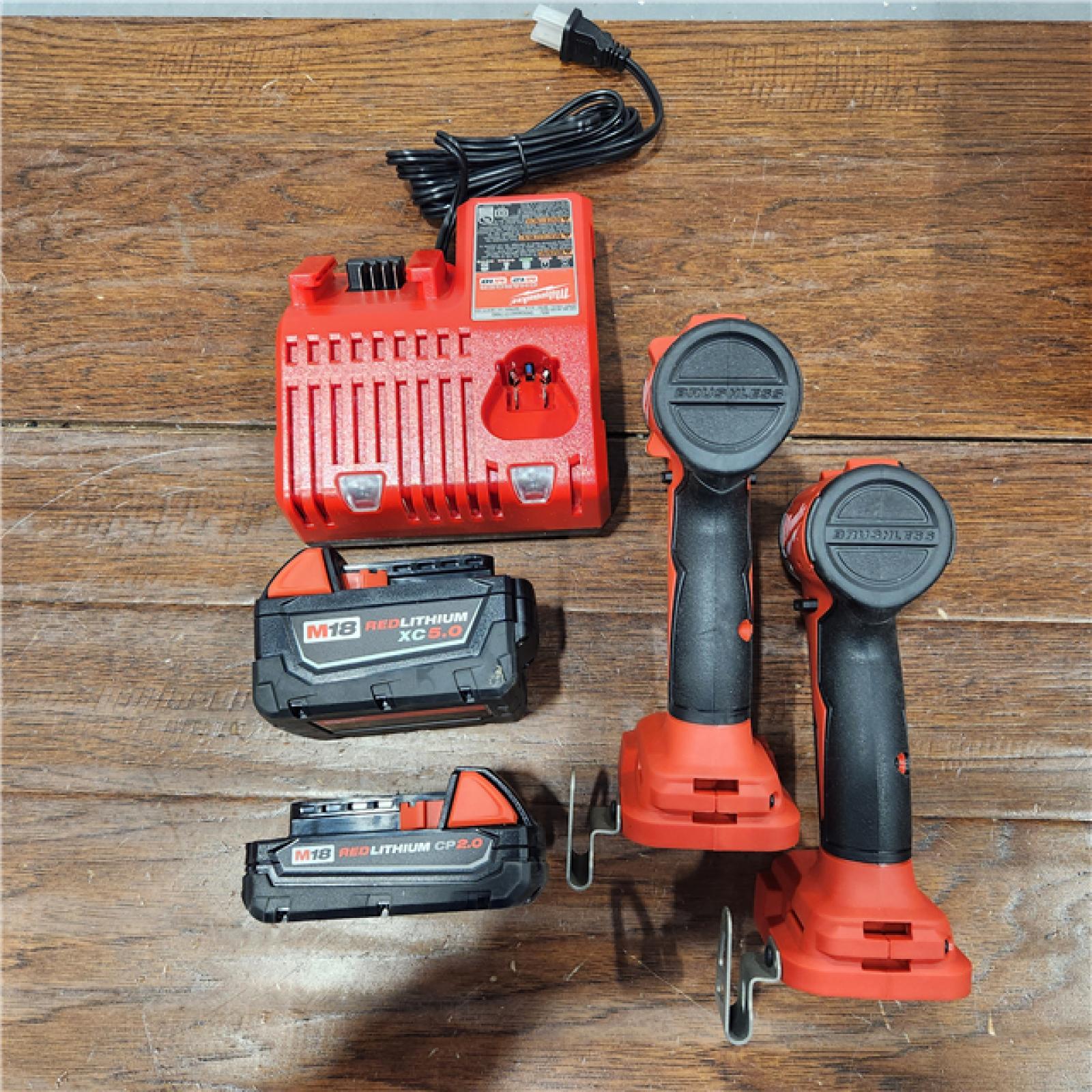 AS-IS M18 18-Volt Lithium-Ion Brushless Cordless Compact Hammer Drill/Impact Combo Kit (2-Tool) with (2) Batteries, Bag