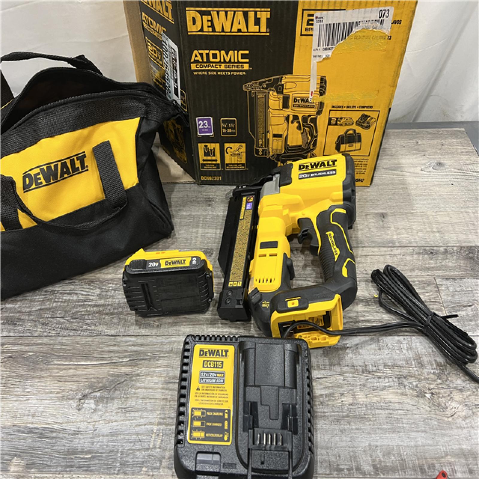 AS-IS DEWALT ATOMIC 20V MAX Lithium Ion Cordless 23 Gauge Pin Nailer Kit with 2.0Ah Battery and Charger