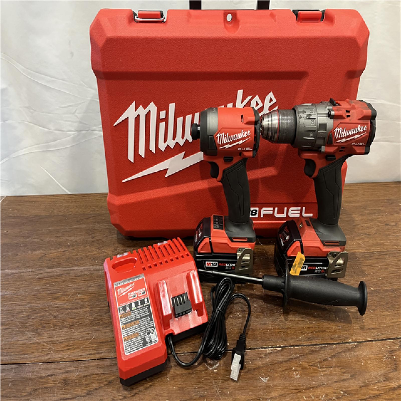 AS-ISMilwaukee M18 FUEL 18V Lithium-Ion Brushless Cordless Hammer Drill and Impact Driver Combo Kit (2-Tool) with 2 Batteries