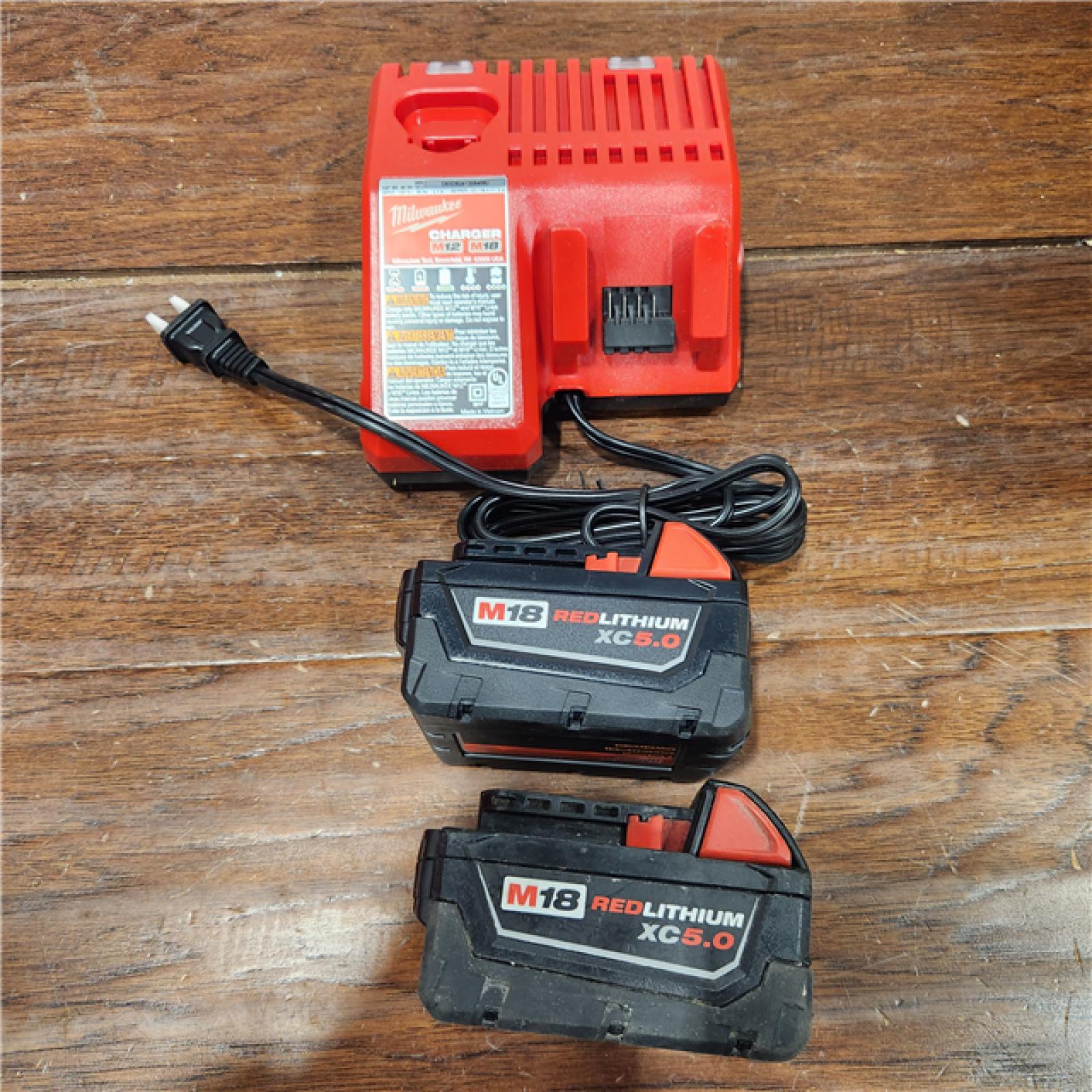 AS-IS Milwaukee M18 18-Volt Lithium-Ion XC Starter Kit with Two 5.0Ah Batteries / Charger (48-59-1852B) (2PACK)