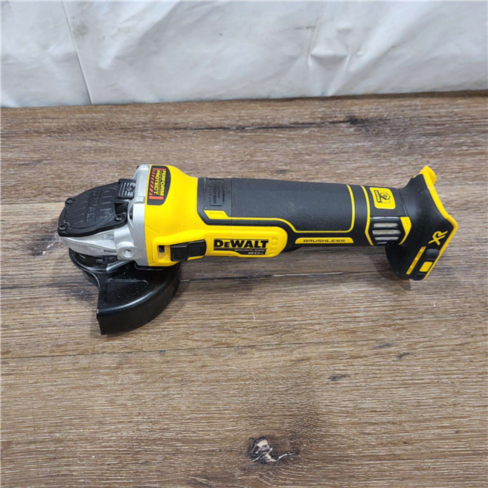 AS-IS DeWalt DCG405B 20V Max XR 4.5-Inch Slide Switch Small Angle Grinder (Tool Only)