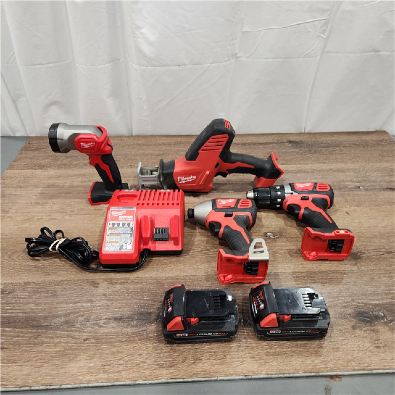 AS-IS M18 18-Volt Lithium-Ion Cordless Combo Kit 4-Tool with Two 2.0 Ah Batteries, Charger and Tool Bag