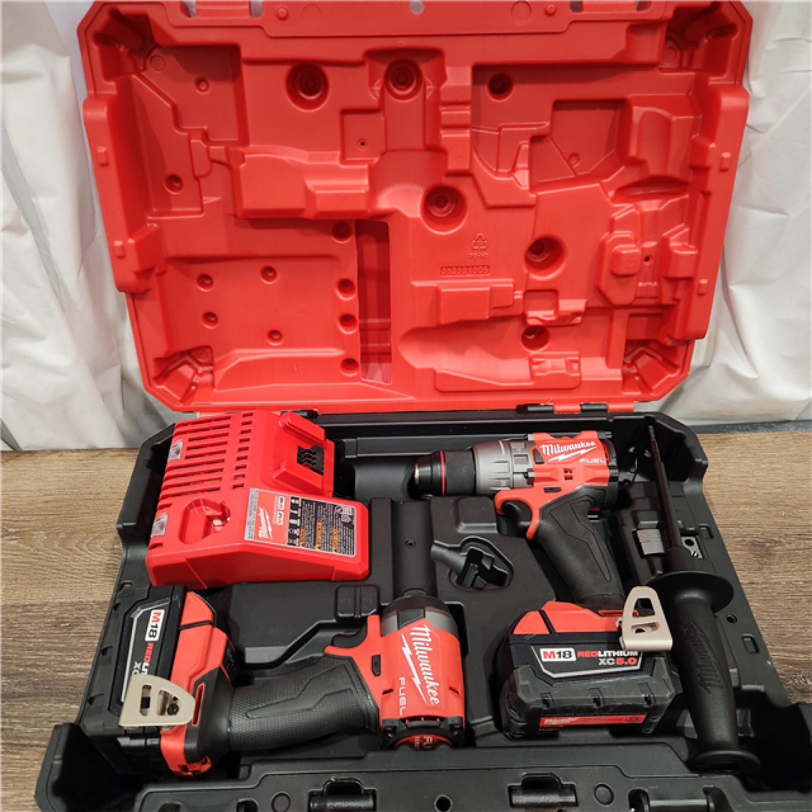 AS-IS Milwaukee M18 FUEL 18V Lithium-Ion Brushless Cordless Hammer Drill and Impact Driver Combo Kit (2-Tool) with 2 Batteries