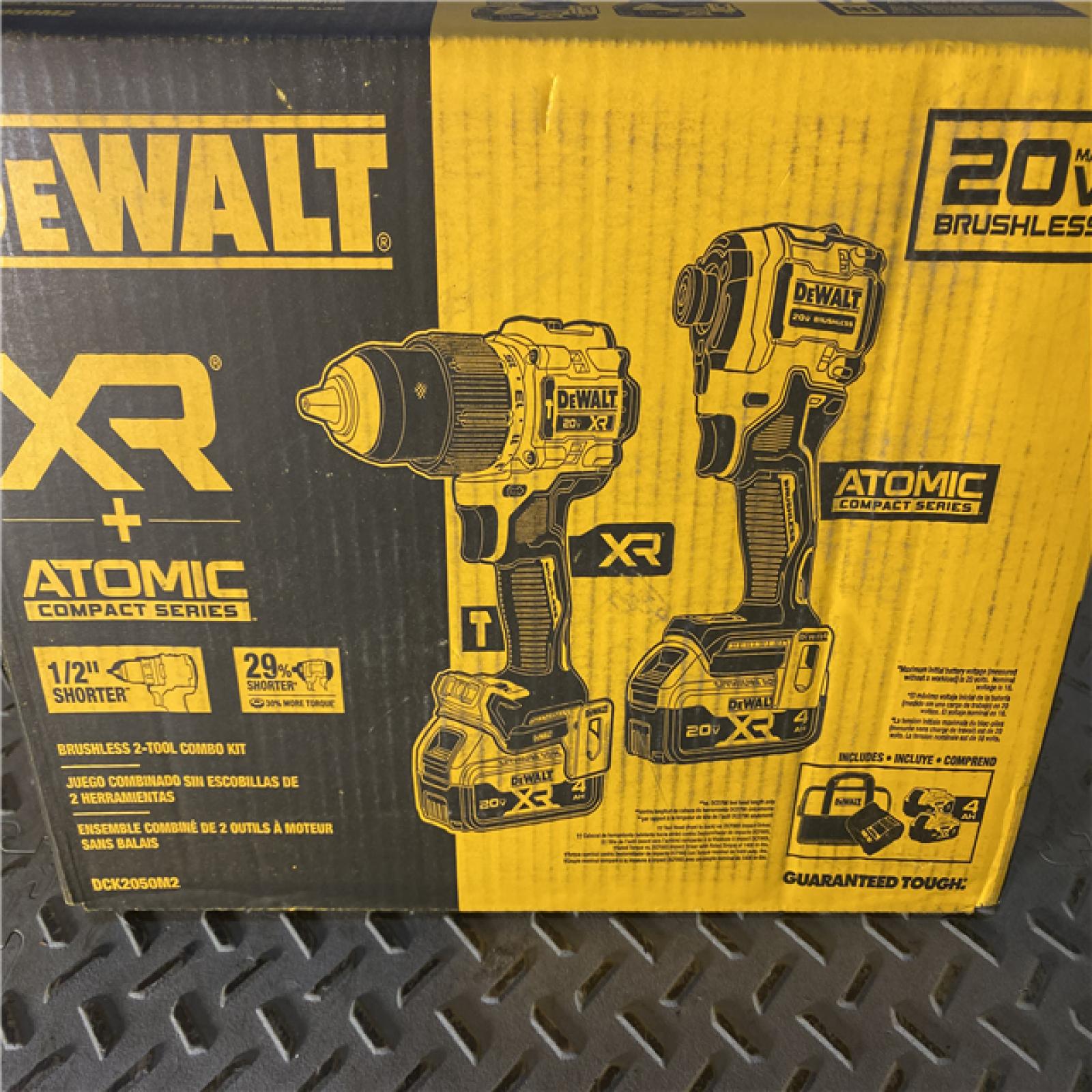 Houston location AS-IS DEWALT 20V MAX XR Hammer Drill and ATOMIC Impact Driver 2 Tool Cordless Combo Kit with (2) 4.0Ah Batteries, Charger, and Bag