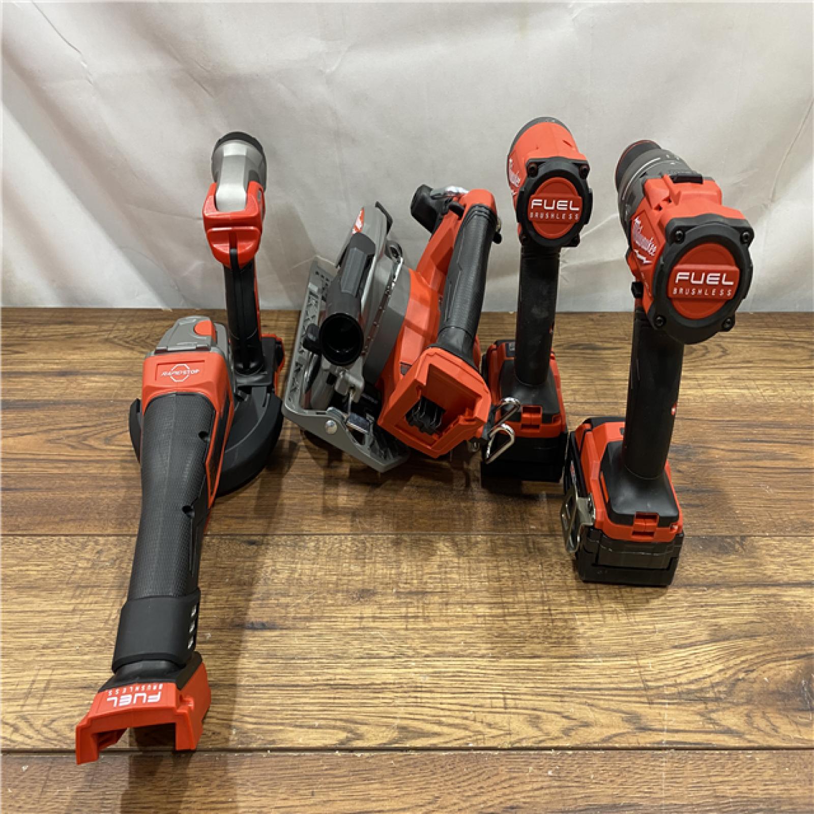 AS IS M18 18-Volt Lithium-Ion Brushless Cordless FUEL Combo Kit (5-Tool) with 2-Batteries, 1-Charger, and Tool Bag