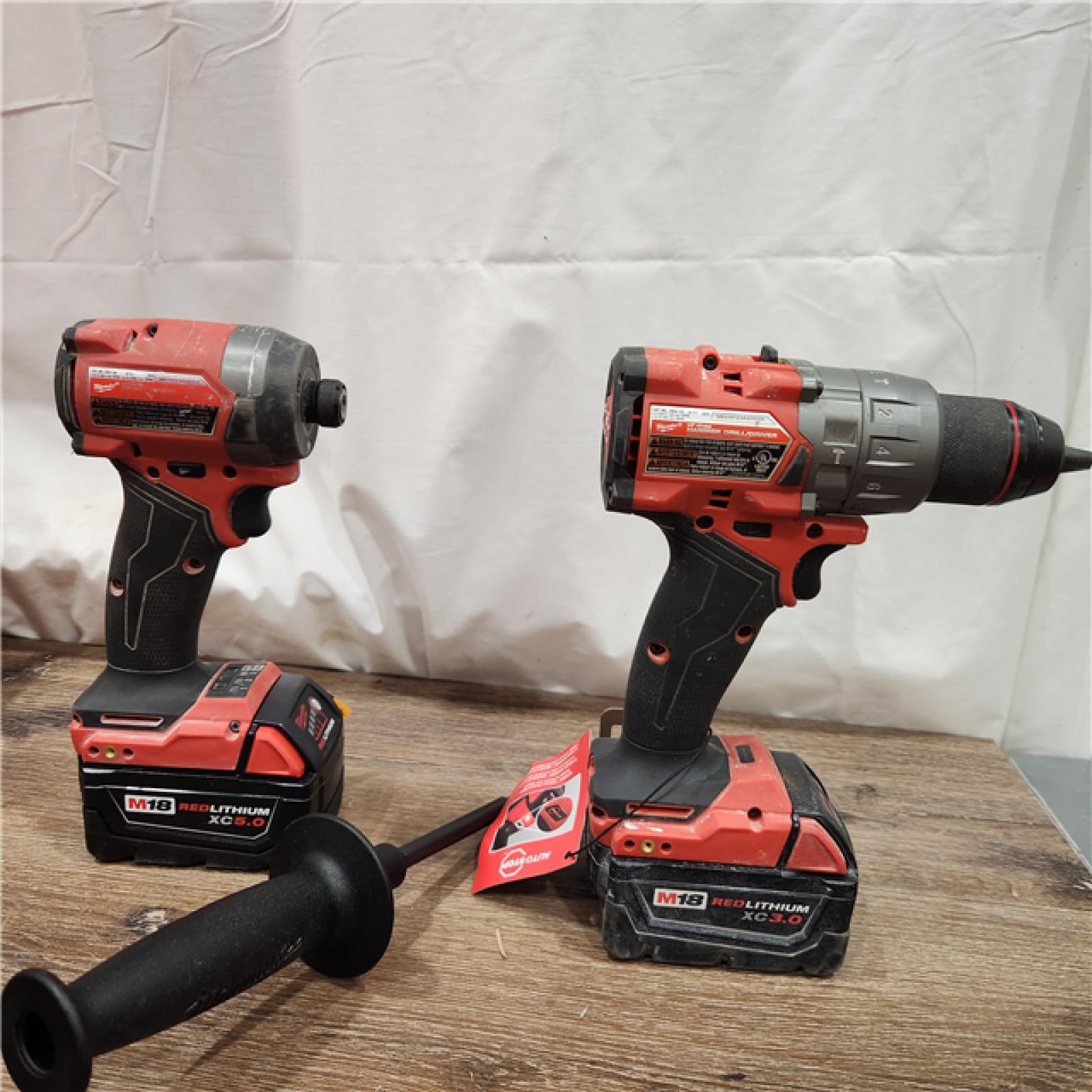 AS-IS Milwaukee M18 FUEL 18V Lithium-Ion Brushless Cordless Hammer Drill and Impact Driver Combo Kit (2-Tool) with 2 Batteries