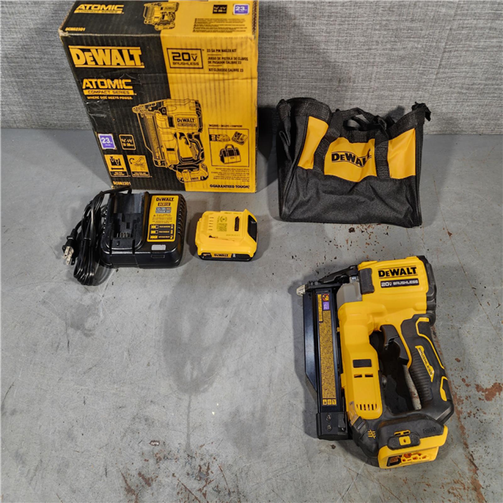 HOUSTON LOCATION - AS-IS (APPEARS LIKE NEW) DEWALT ATOMIC 20V MAX Lithium Ion Cordless 23 Gauge Pin Nailer Kit with 3.0Ah Battery and Charger