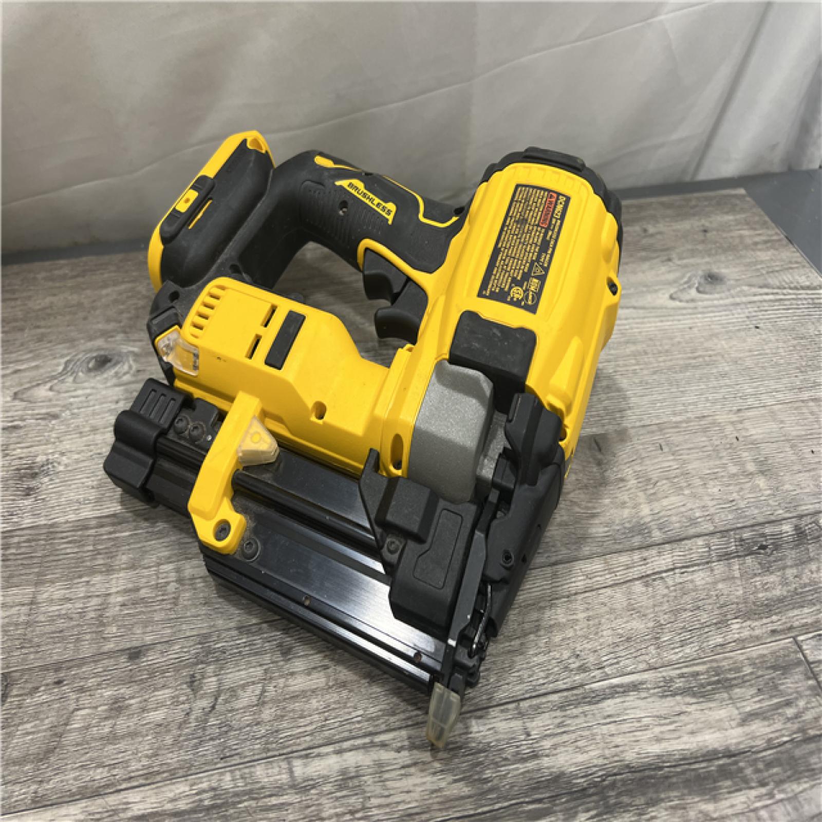 AS-IS DEWALT ATOMIC 20V MAX Lithium Ion Cordless 23 Gauge Pin Nailer Kit with 2.0Ah Battery and Charger