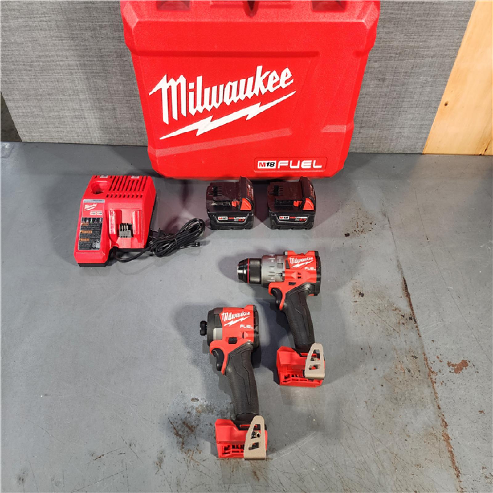 HOUSTON LOCATION - AS-IS Milwaukee M18 FUEL 18V Lithium-Ion Brushless Cordless Hammer Drill and Impact Driver Combo Kit (2-Tool) with 2 Batteries