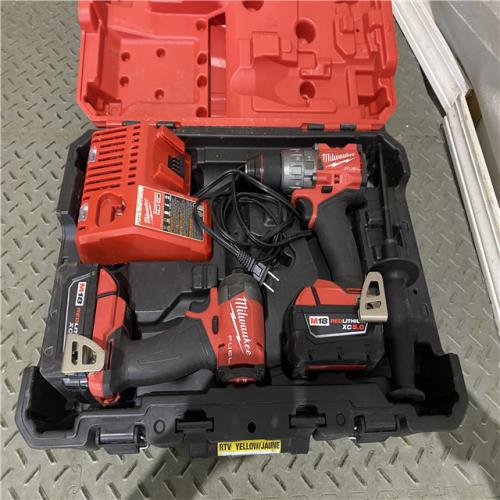 Houston location AS-IS Milwaukee 3697-22 M18 FUEL 1/2 Hammer Driller/Driver &1/4 Hex Impact Driver 2 Tool Combo Kit