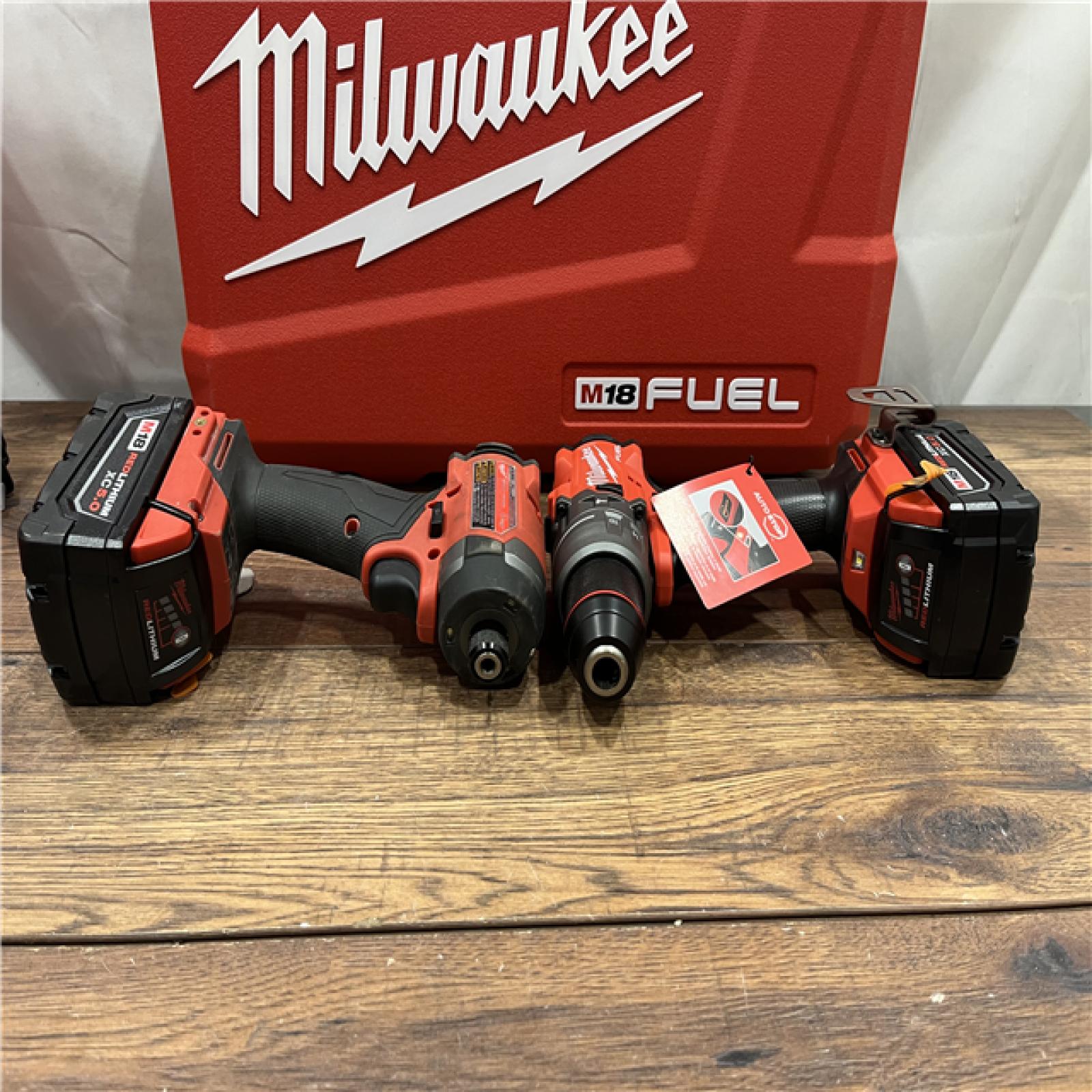 AS-IS Milwaukee M18 FUEL 18V Lithium-Ion Brushless Cordless Hammer Drill and Impact Driver Combo Kit (2-Tool) with 2 Batteries