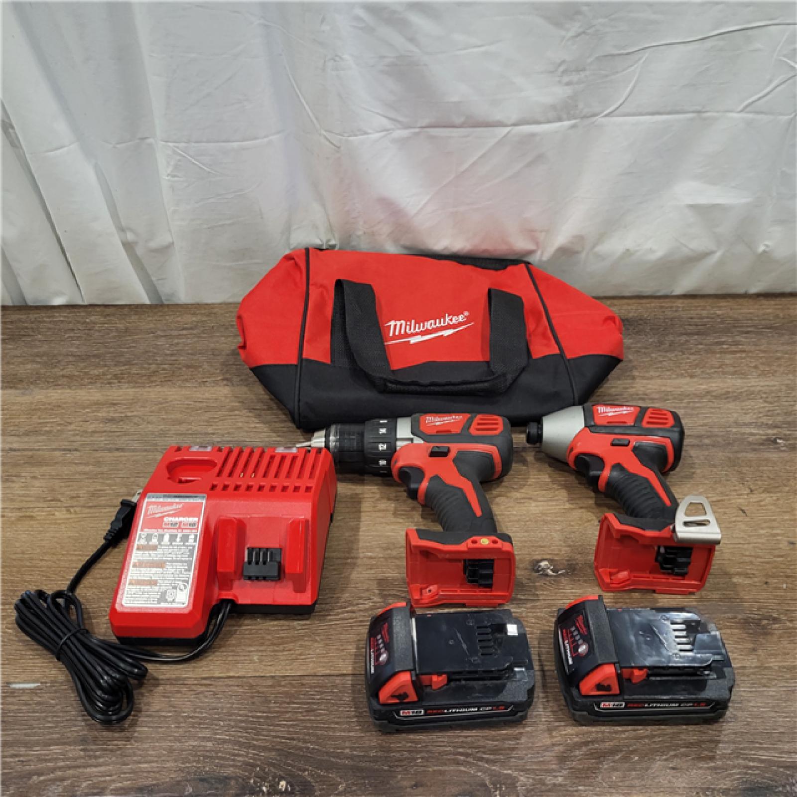 AS-IS Milwaukee M18 18V Cordless Brushed 2 Tool Drill/Driver and Impact Driver Kit