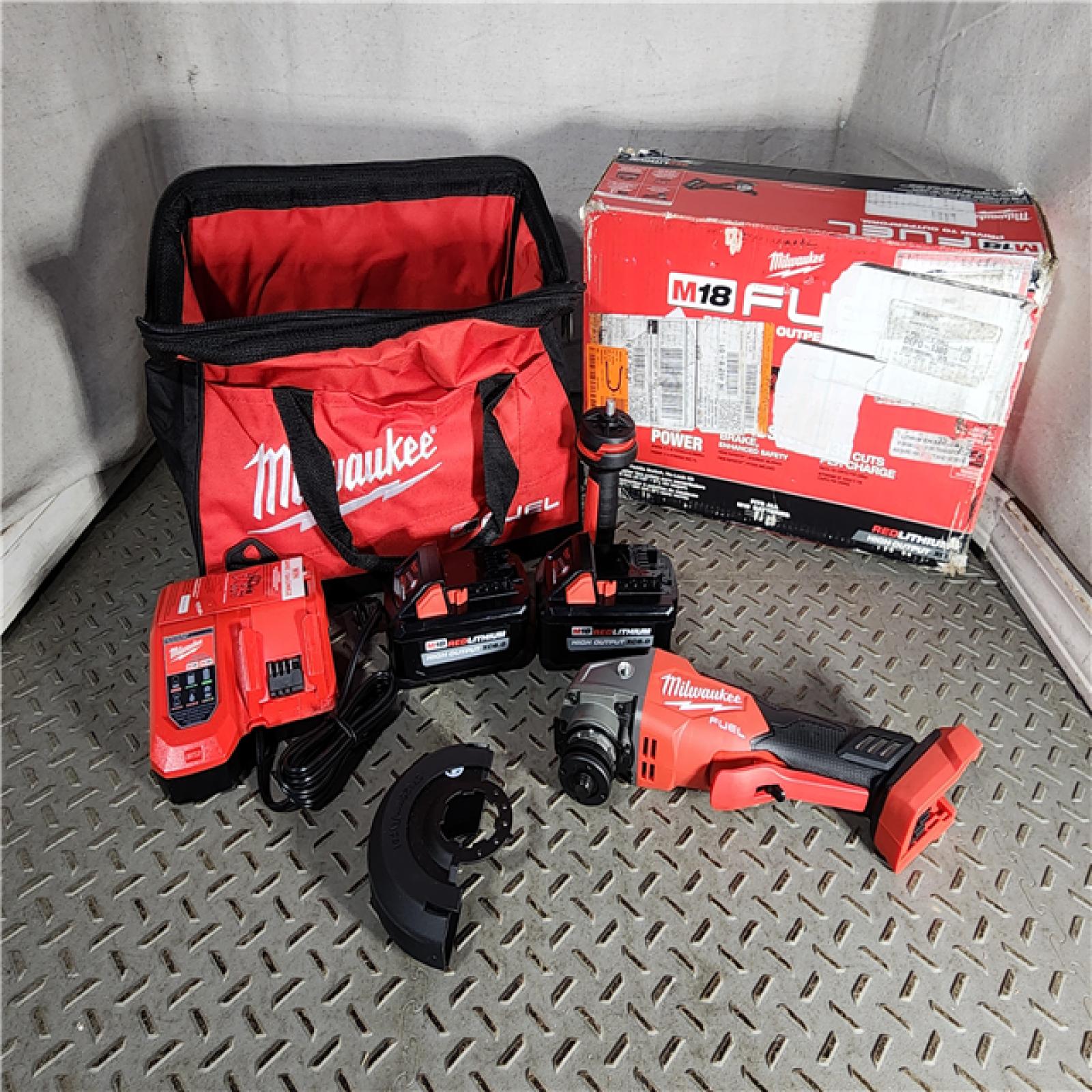 HOUSTON LOCATION - AS-IS (APPEARS LIKE NEW) 1 Set  Milwaukee 2880-22 M18 4.5  - 5  Cordless No-Lock Grinder Paddle Switch Kit