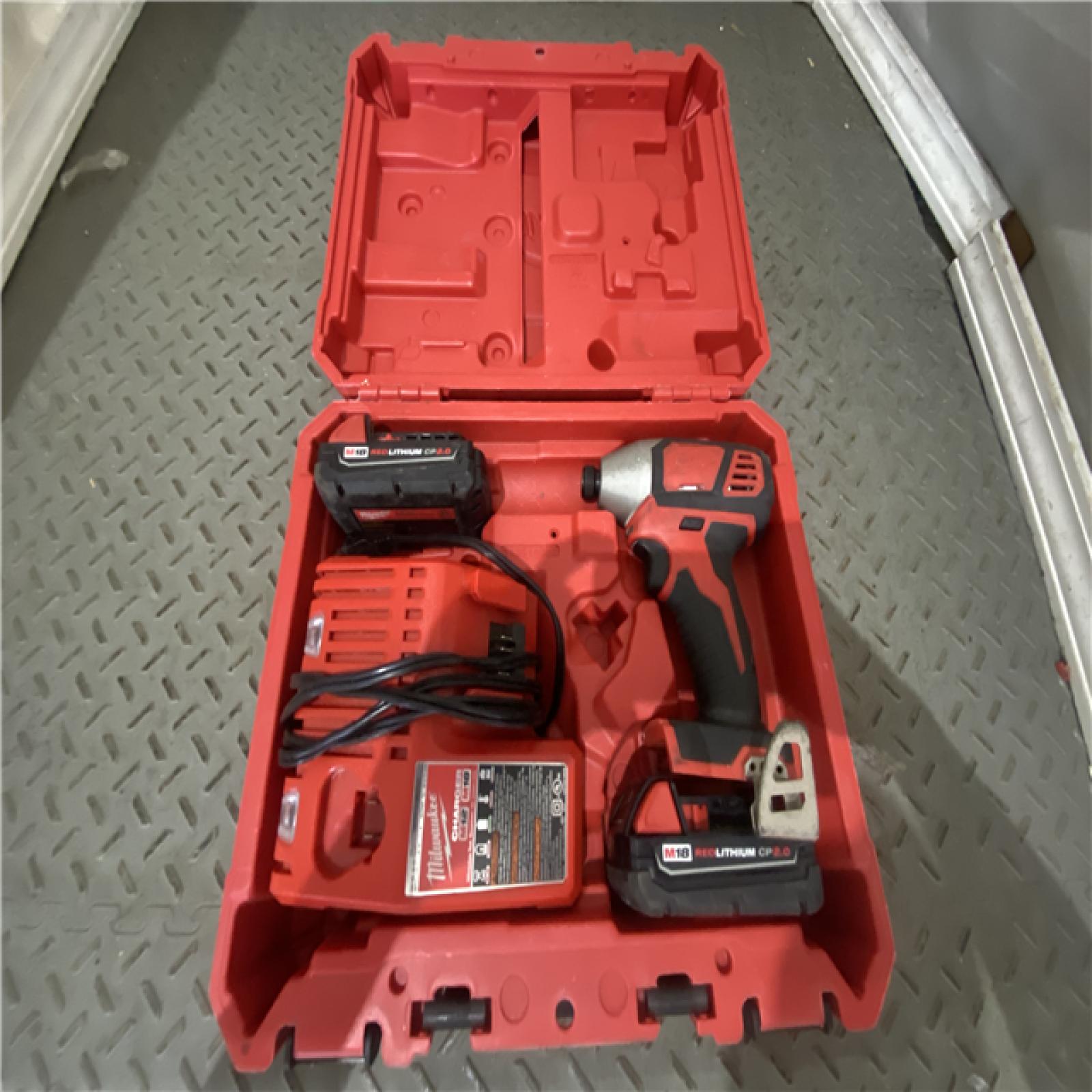 Houston location AS-IS Milwaukee 2850-22CT M18 18V Lithium-Ion Brushless Cordless 1/4 Hex Impact Driver Kit 2.0 Ah