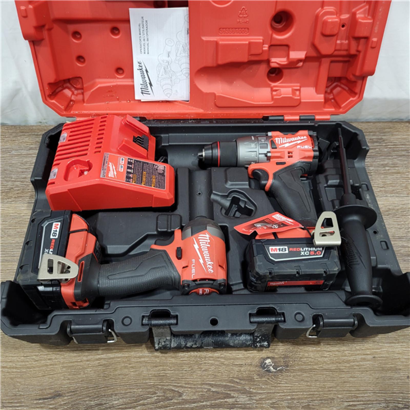 AS-IS M18 FUEL 18V Lithium-Ion Brushless Cordless Hammer Drill and Impact Driver Combo Kit (2-Tool) with 2 Batteries