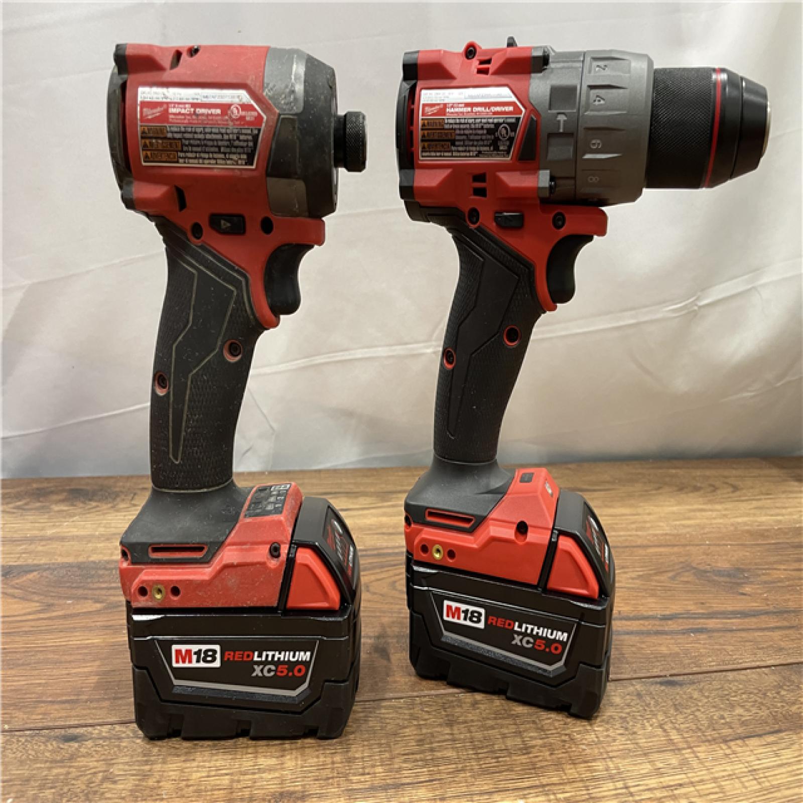 AS-IS Milwaukee M18 FUEL 18V Lithium-Ion Brushless Cordless Hammer Drill and Impact Driver Combo Kit