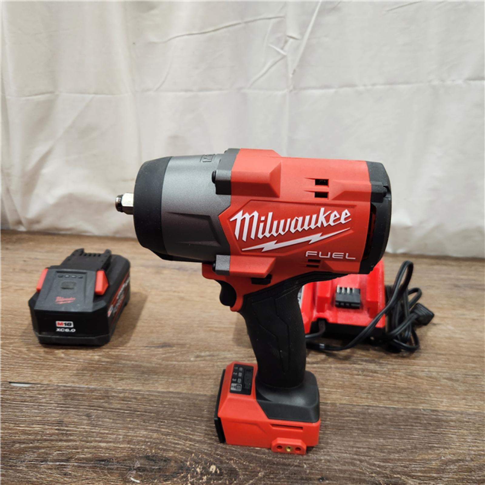 AS-IS Milwaukee M18 1/2 in. Cordless Brushless High Torque Impact Wrench Kit (Battery & Charger)