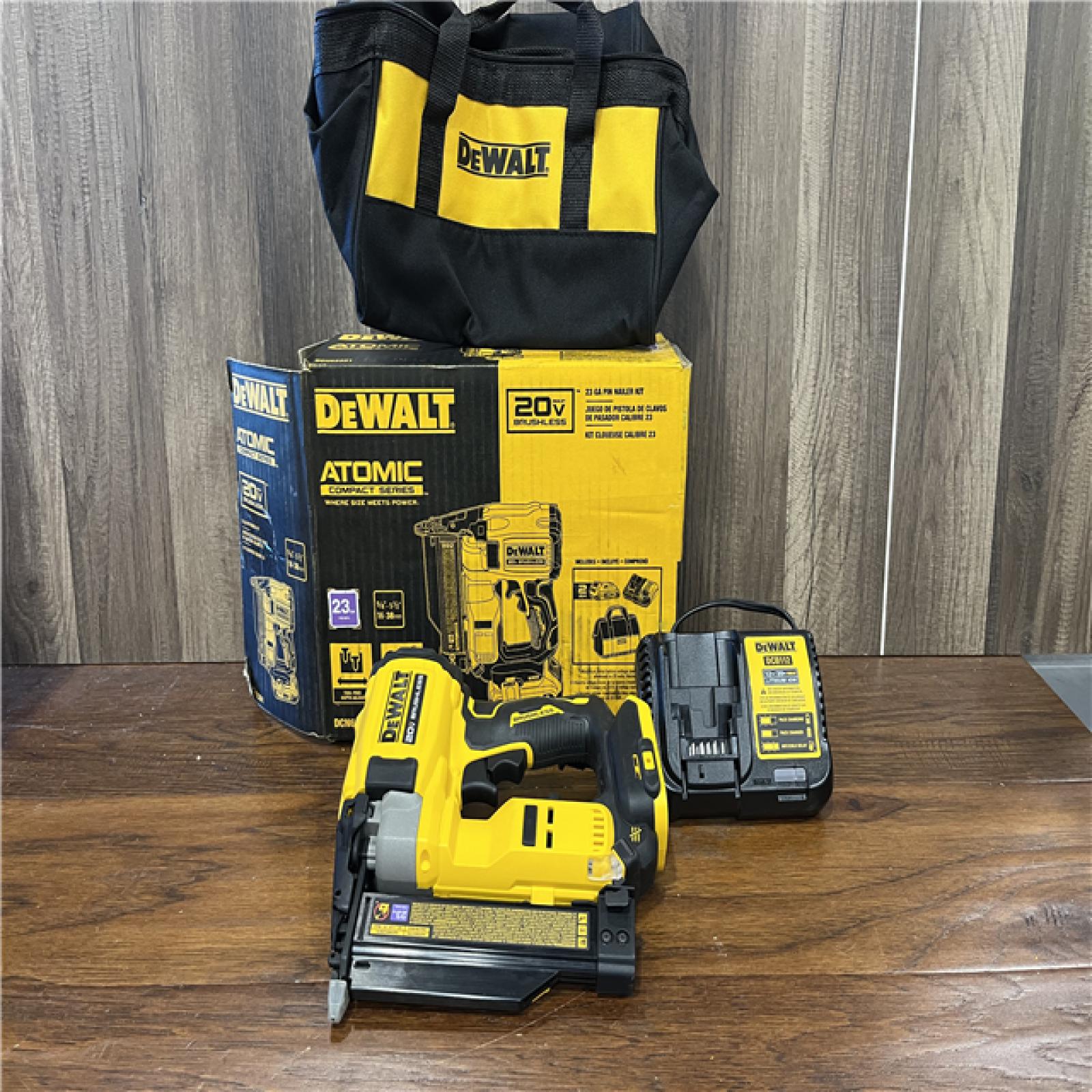 AS-IS DEWALT ATOMIC 20V MAX Lithium Ion Cordless 23 Gauge Pin Nailer /Charger