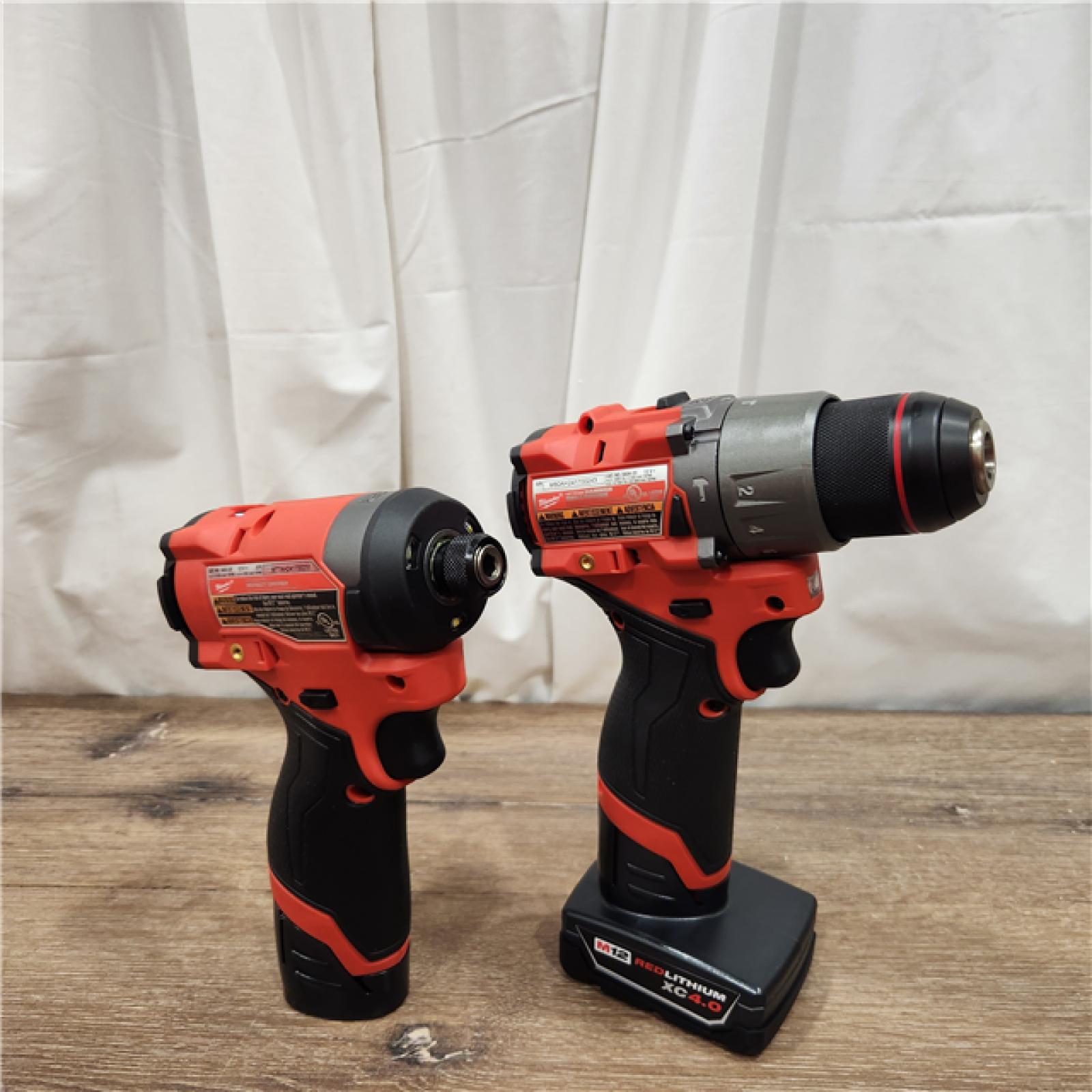 AS-IS Milwaukee 3497-22 12V Brushless Hammer Drill and Impact Driver Combo Kit