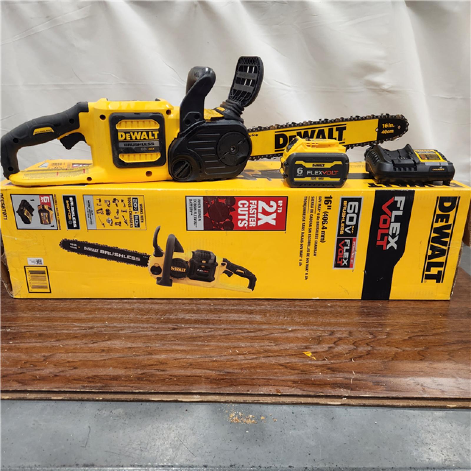 AS-IS DEWALT  FLEXVOLT 60V MAX 16in. Brushless Cordless Battery Powered Chainsaw Kit with (1) FLEXVOLT 2 Ah Battery & Charger