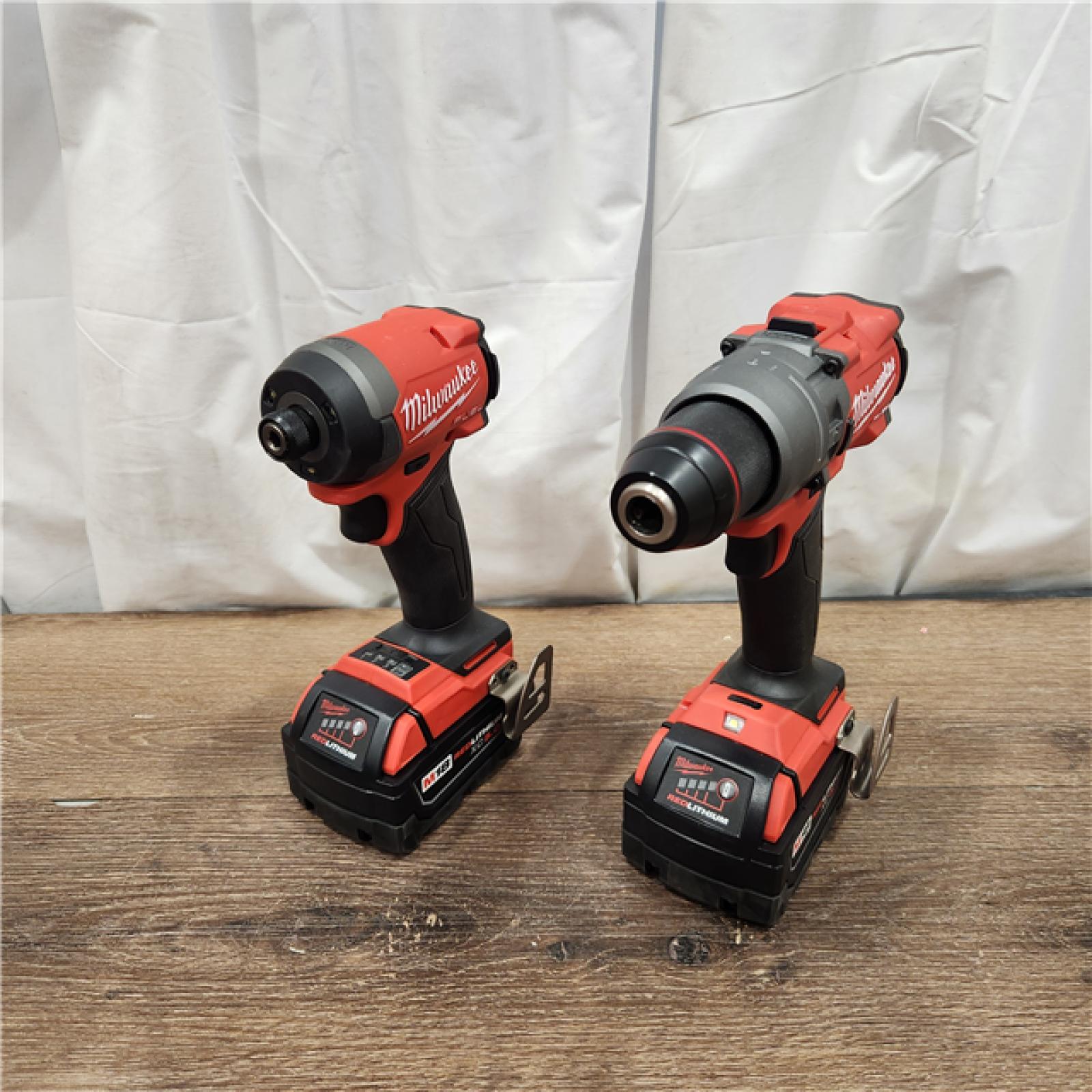 AS-IS Milwaukee M18 FUEL 18V Lithium-Ion Brushless Cordless Hammer Drill and Impact Driver Combo Kit (2-Tool) with 2 Batteries