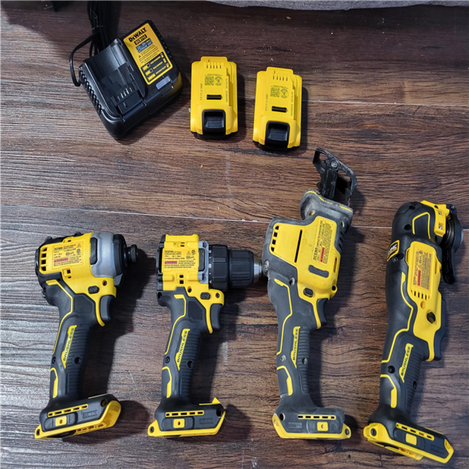 CALIFORNIA AS-IS DEWALT BRUSHLESS 4-TOOL COMBO KIT(BATTERIES,CHARGER,AND BAG INCLUDED)