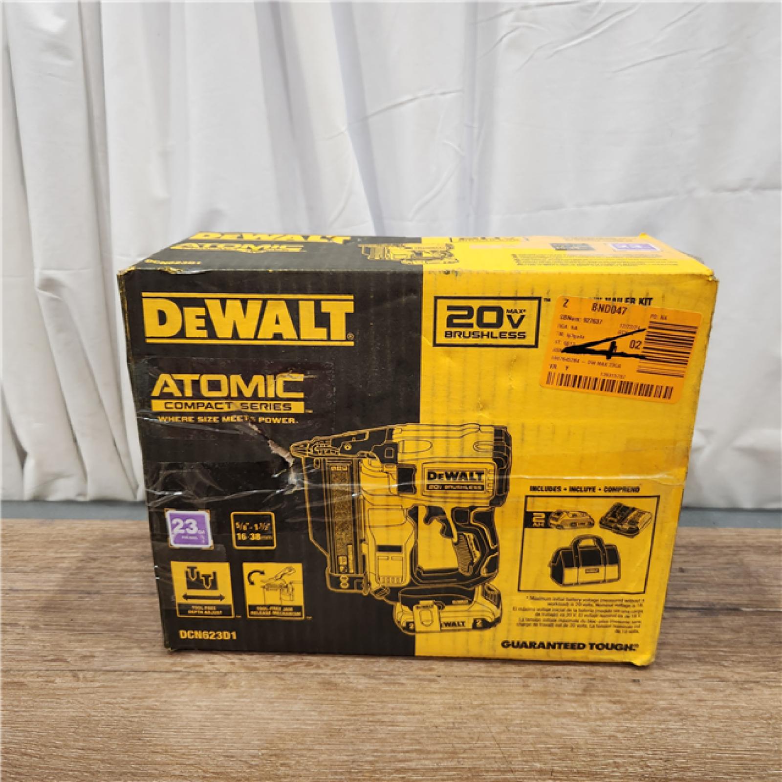 AS-IS DEWALT ATOMIC 20V MAX Lithium Ion Cordless 23 Gauge Pin Nailer Kit with 3.0Ah Battery and Charger