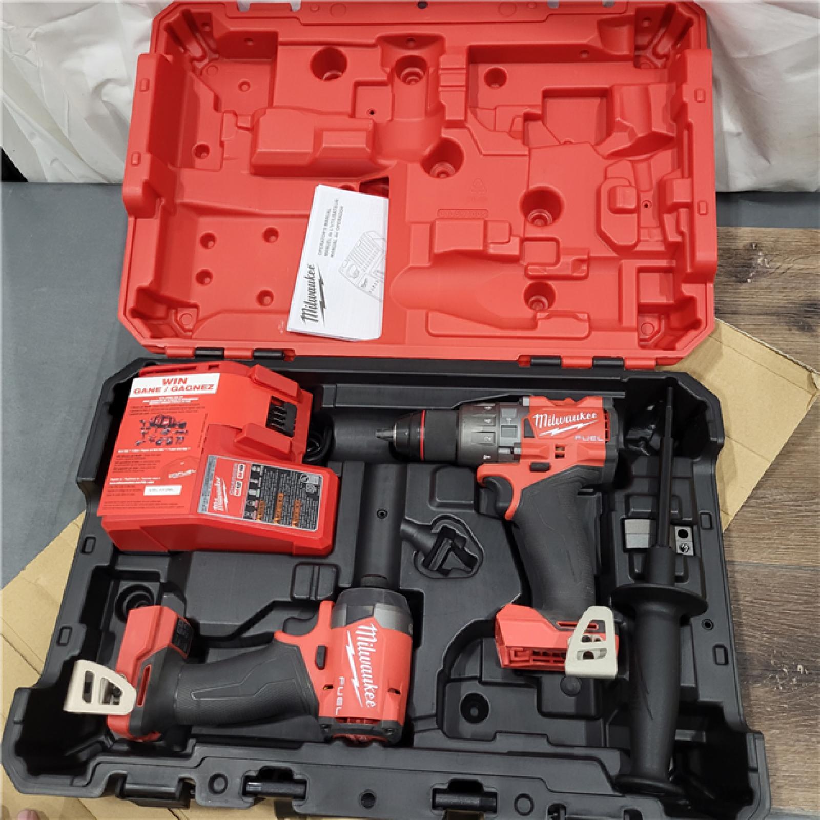 AS-IS Milwaukee M18 FUEL 18V Lithium-Ion Brushless Cordless Hammer Drill and Impact Driver Combo Kit (2-Tool) with 2 Batteries