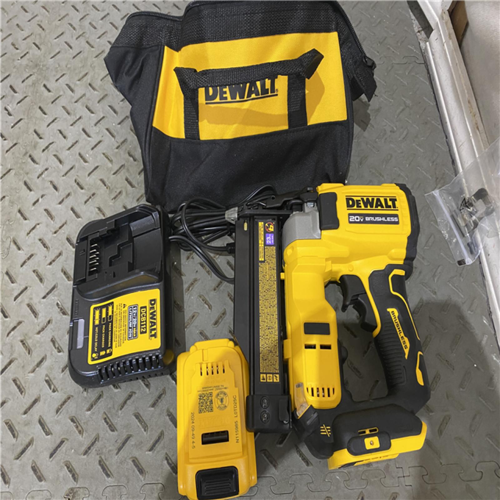 Houston location AS-IS DEWALT ATOMIC 20V MAX Lithium Ion Cordless 23 Gauge Pin Nailer Kit with 2.0Ah Battery and Charger