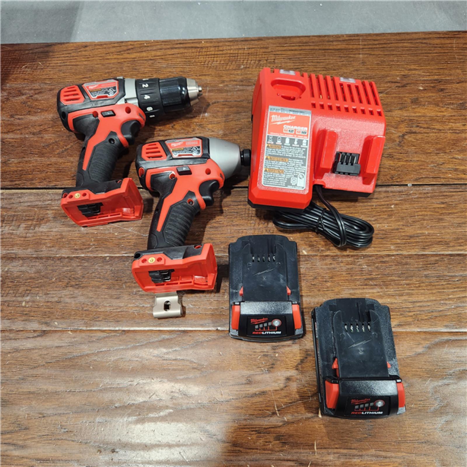 AS-IS Milwaukee M18 18V Cordless Brushed 2 Tool Drill/Driver and Impact Driver Kit