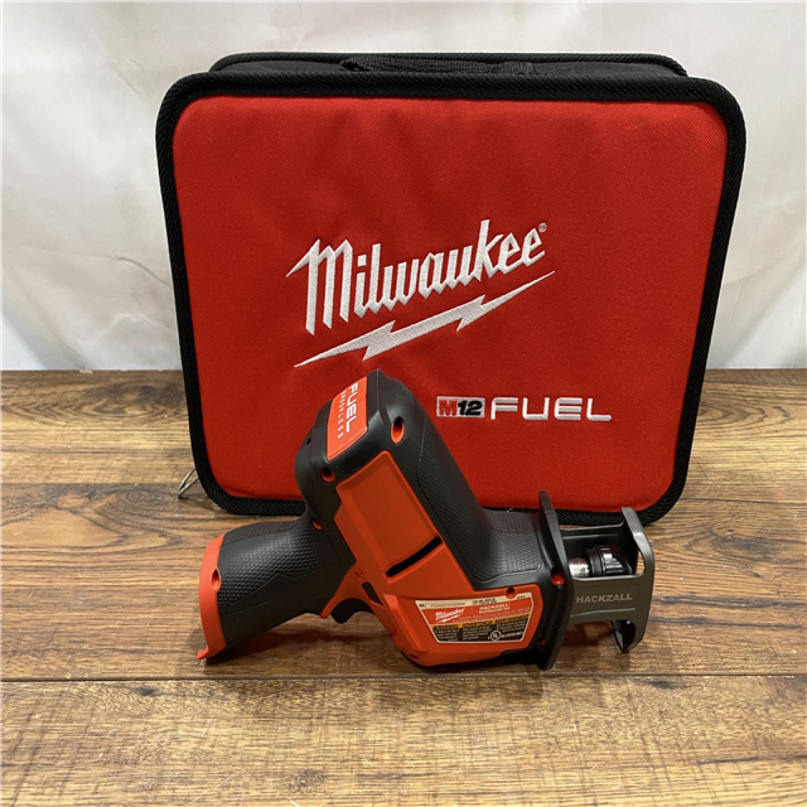 AS IS Milwaukee M12 FUEL 12-Volt Lithium-Ion Brushless Cordless HACKZALL Reciprocating Saw Kit W/ Free M12 2.0Ah Compact Battery