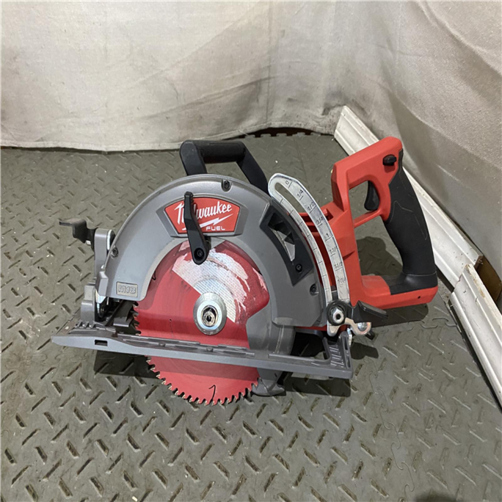 Houston location AS-IS Milwaukee 2830-20 Rear Handle Circular Saw M18 FUEL 7-1/4  Cordless Brushless Tool Only