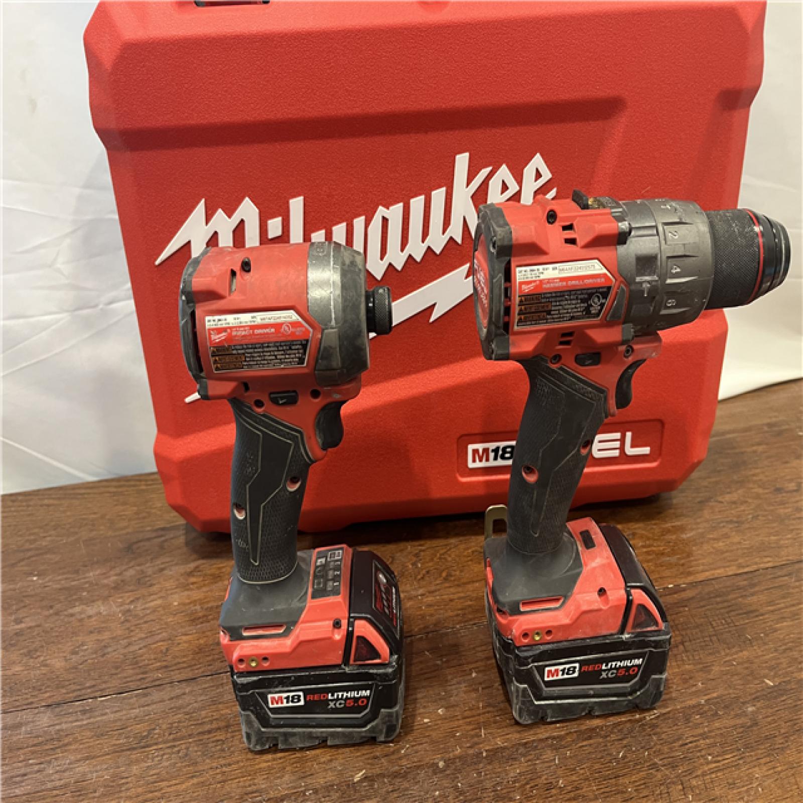 AS-ISMilwaukee M18 FUEL 18V Lithium-Ion Brushless Cordless Hammer Drill and Impact Driver Combo Kit (2-Tool) with 2 Batteries