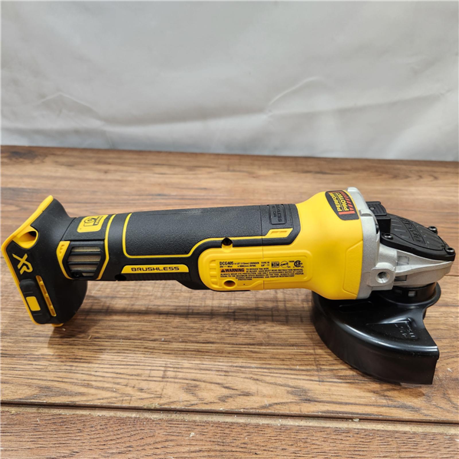 AS-IS DeWalt 20V MAX XR Cordless Brushless 4.5 in. Slide Switch Small Angle Grinder with Kickback Brake (Tool Only)