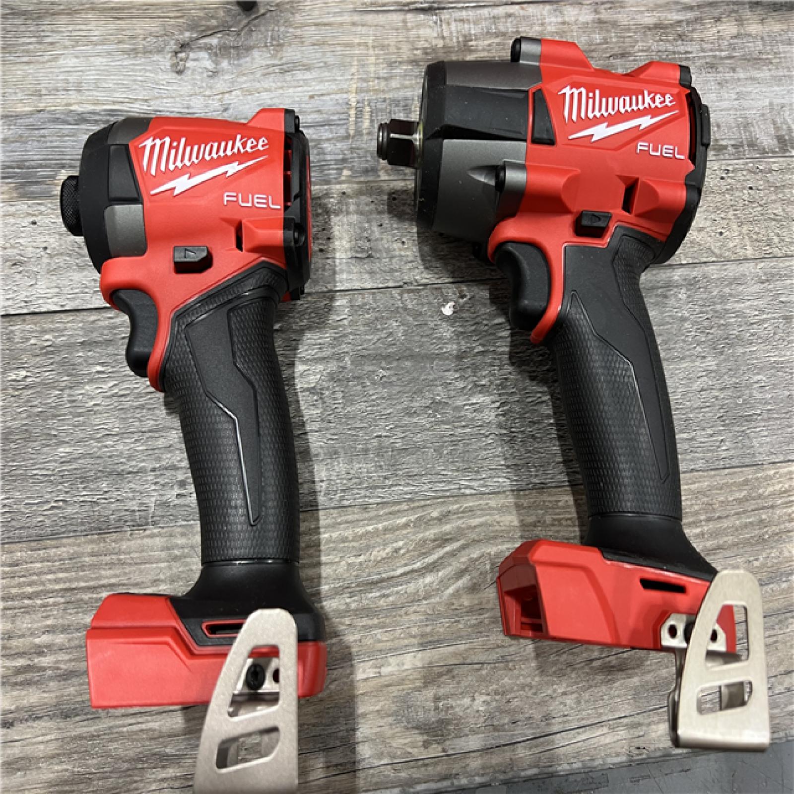 AS-IS Milwaukee M18 FUEL 18V Lithium-Ion Brushless Cordless Combo Kit with Two 5.0 Ah Batteries  1 Charger  2 Tool Bags (7-Tool)