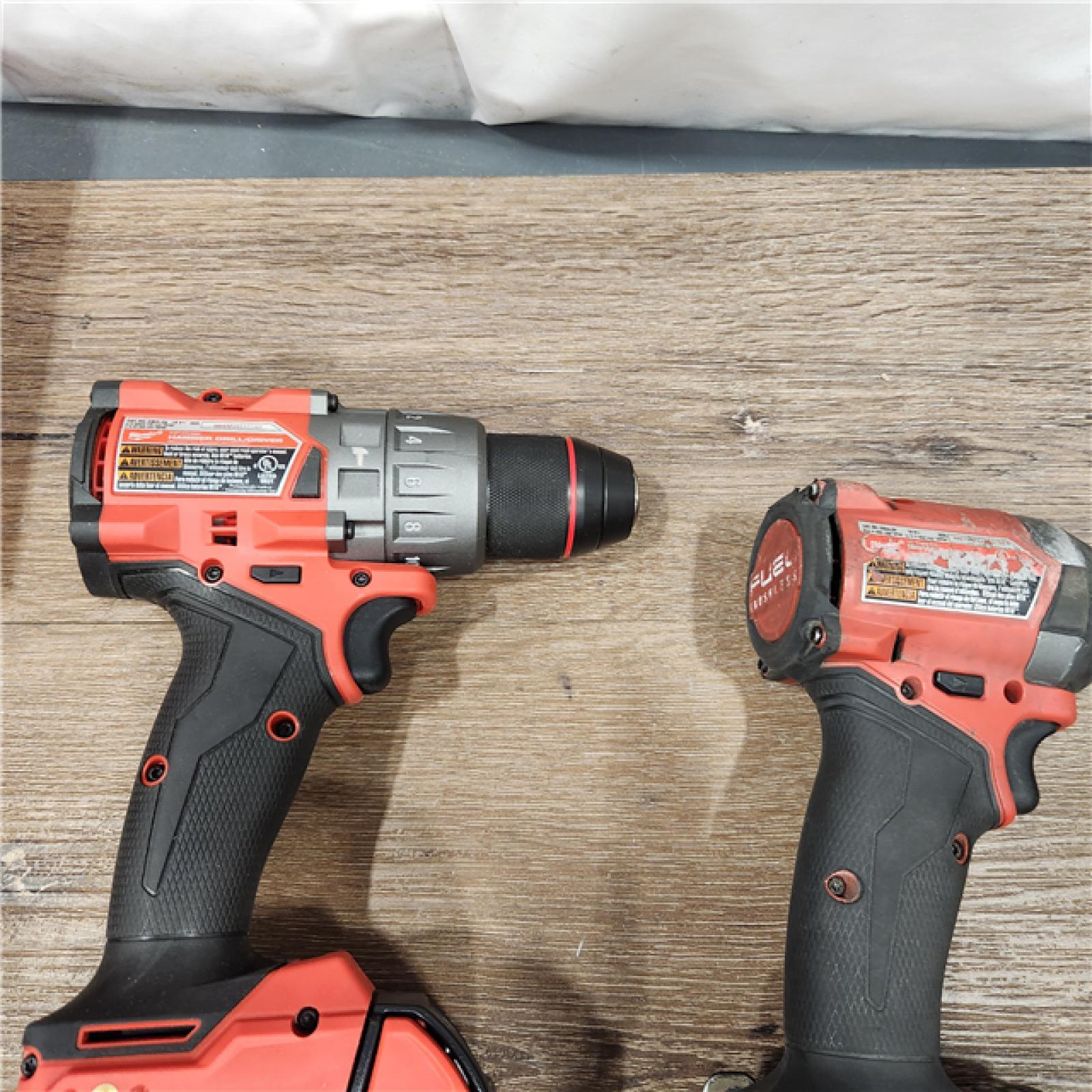 AS-IS Milwaukee M18 FUEL 18V Lithium-Ion Brushless Cordless Hammer Drill and Impact Driver Combo Kit (2-Tool) with 2 Batteries