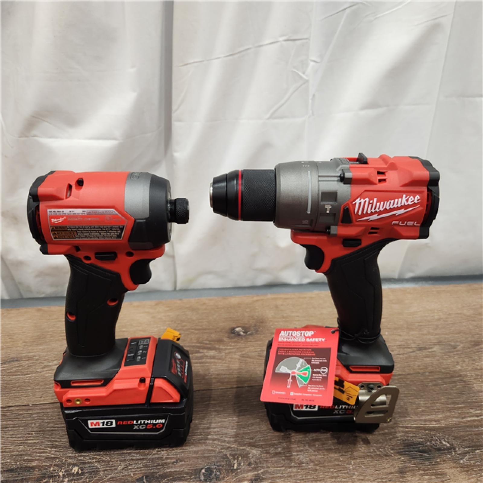 AS-IS Milwaukee M18 FUEL 18V Lithium-Ion Brushless Cordless Hammer Drill and Impact Driver Combo Kit (2-Tool) with 2 Batteries