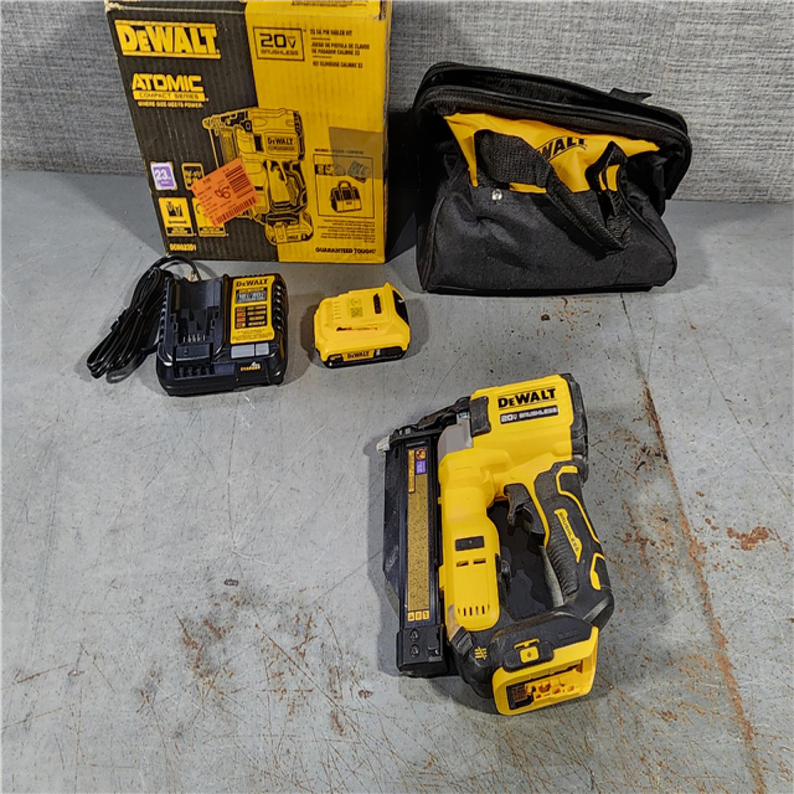 HOUSTON LOCATION - AS-IS DEWALT ATOMIC 20V MAX Lithium Ion Cordless 23 Gauge Pin Nailer Kit with 2.0Ah Battery and Charger