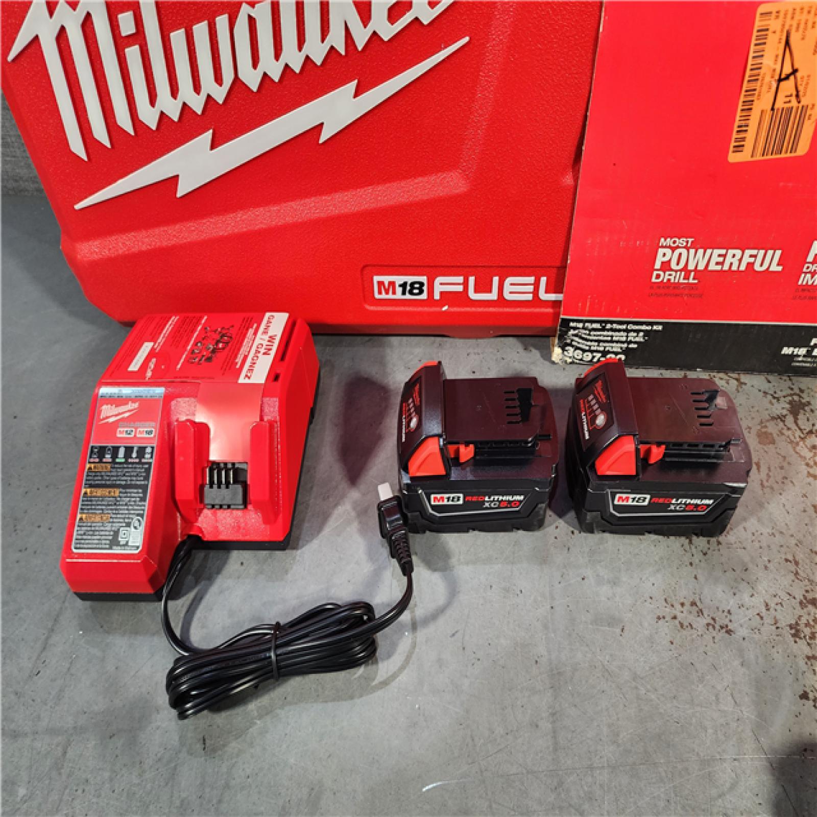 HOUSTON LOCATION - AS-IS (APPEARS LIKE NEW) Milwaukee M18 FUEL 18V Lithium-Ion Brushless Cordless Hammer Drill and Impact Driver Combo Kit (2-Tool) with 2 Batteries