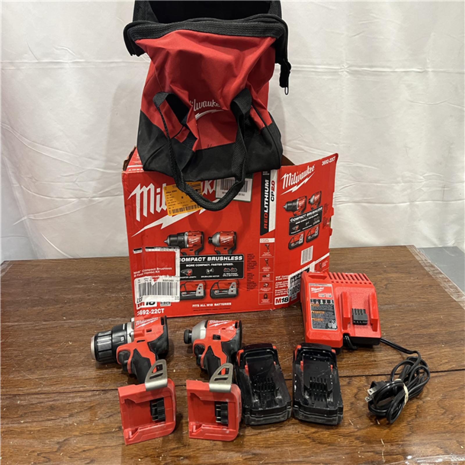 AS-IS M18 18V Lithium-Ion Brushless Cordless Compact Drill/Impact Combo Kit (2-Tool) W/(2) 2.0 Ah Batteries, Charger & Bag