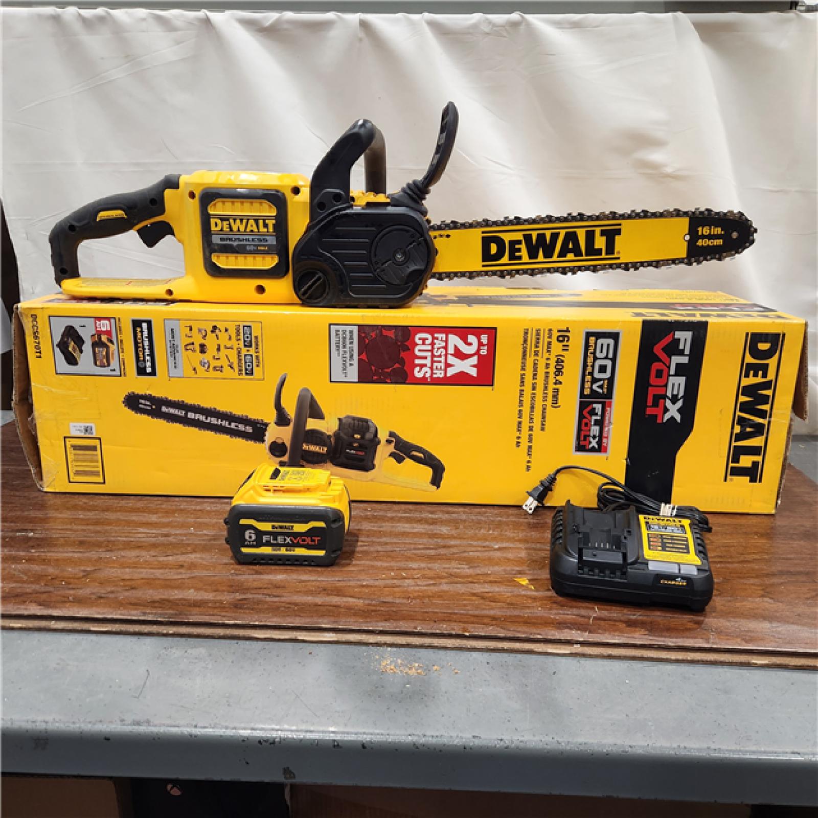 AS-IS DEWALT  FLEXVOLT 60V MAX 16in. Brushless Cordless Battery Powered Chainsaw Kit with (1) FLEXVOLT 2 Ah Battery & Charger