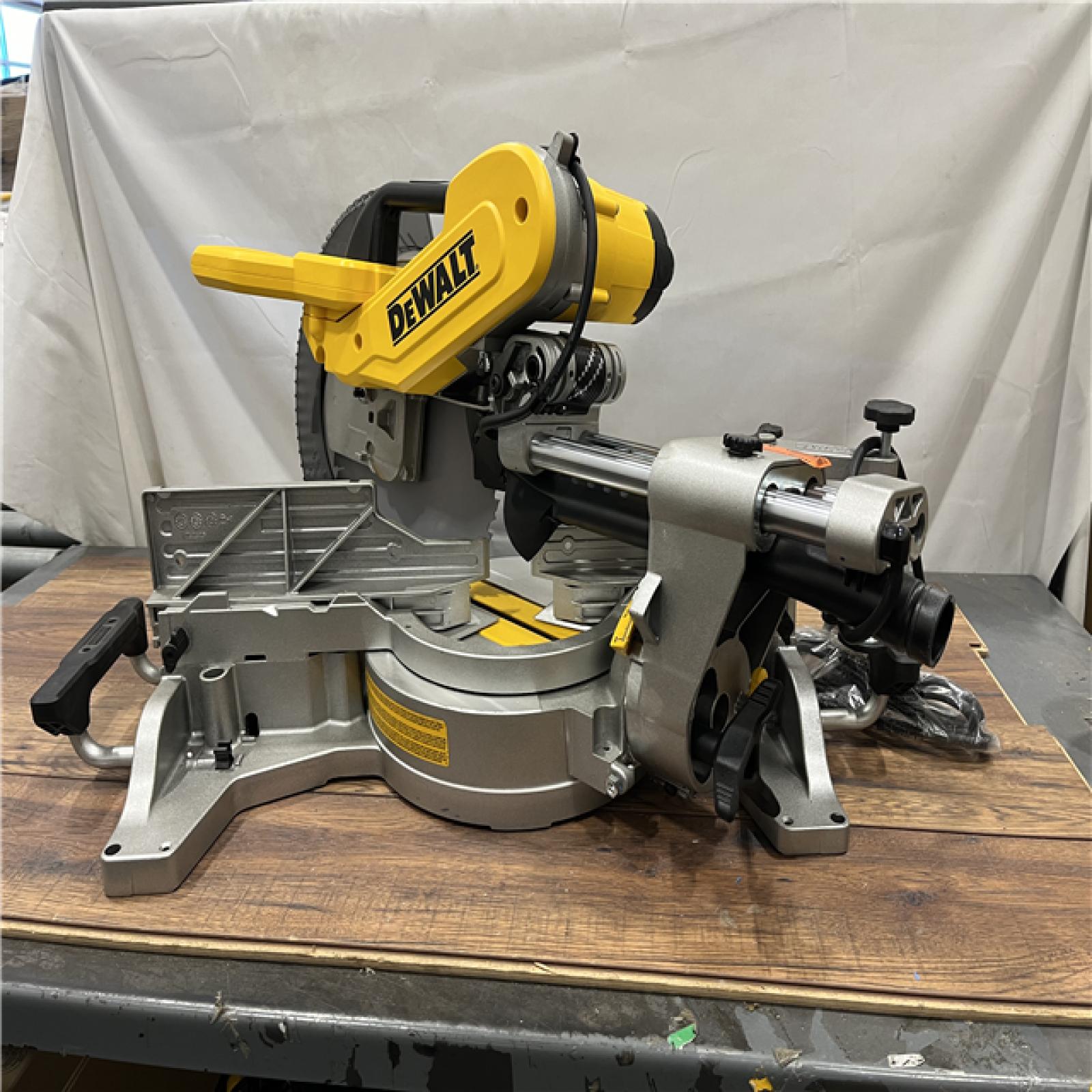 AS-IS DEWALT 15 Amp Corded 12 in. Double Bevel Sliding Compound Miter Saw, Blade Wrench and Material Clamp