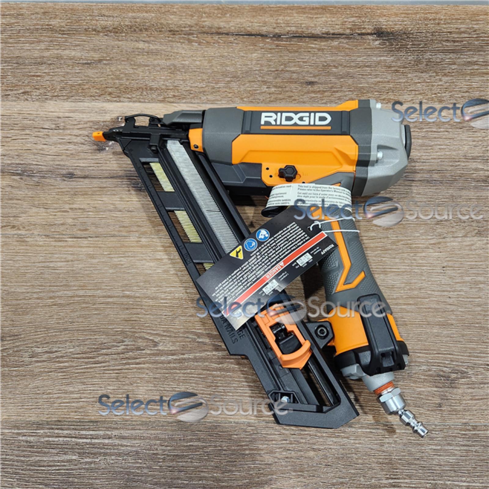 AS-IS Ridgid 15-Gauge 2-1/2 in. Angled Finish Nailer with CLEAN DRIVE Technology, Tool Bag and Sample Nails