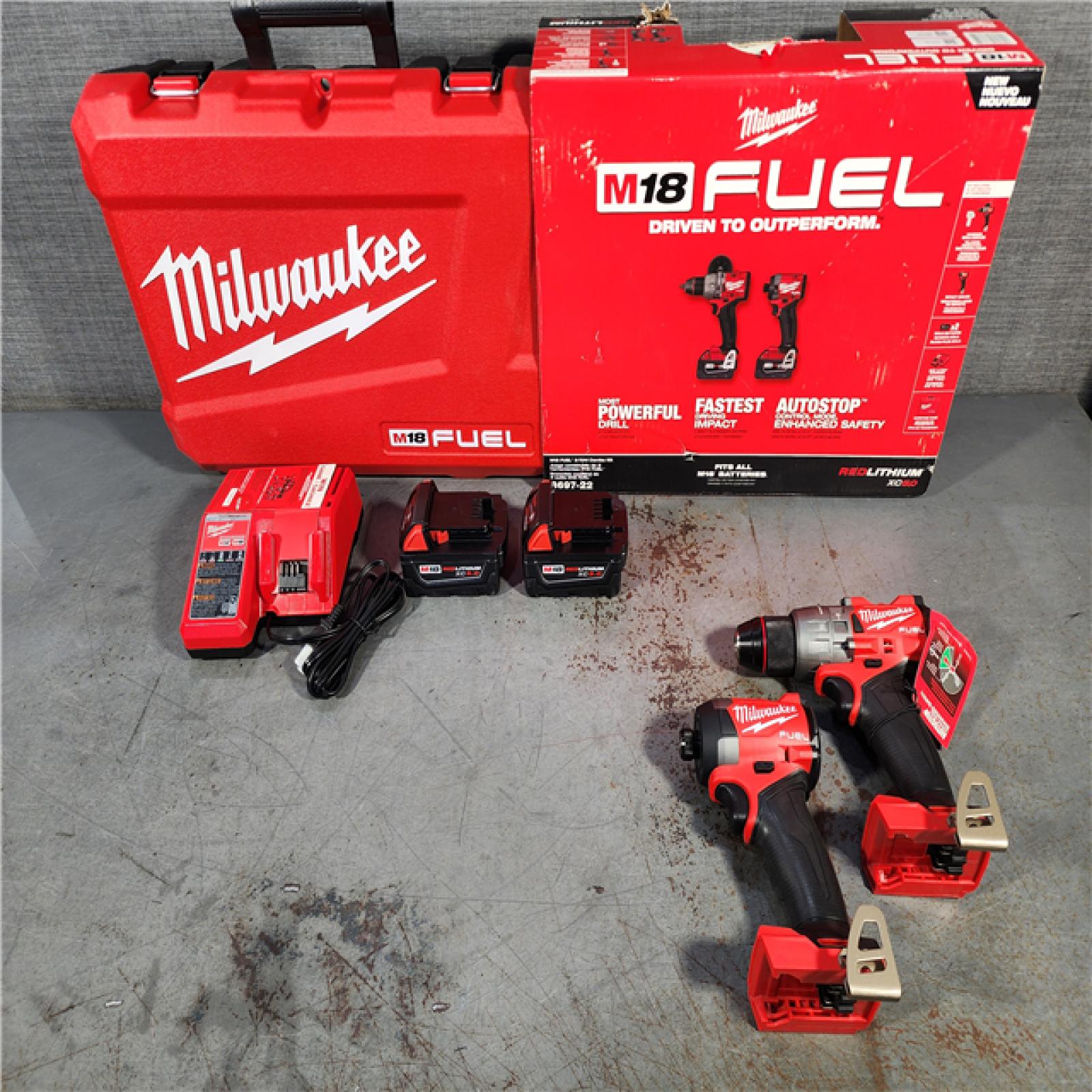 HOUSTON LOCATION - AS-IS (APPEARS LIKE NEW) Milwaukee M18 FUEL 18V Lithium-Ion Brushless Cordless Hammer Drill and Impact Driver Combo Kit (2-Tool) with 2 Batteries